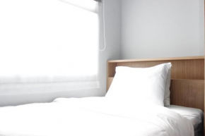 Modern 2BR Apartment at Grand Asia Afrika Residence By Travelio